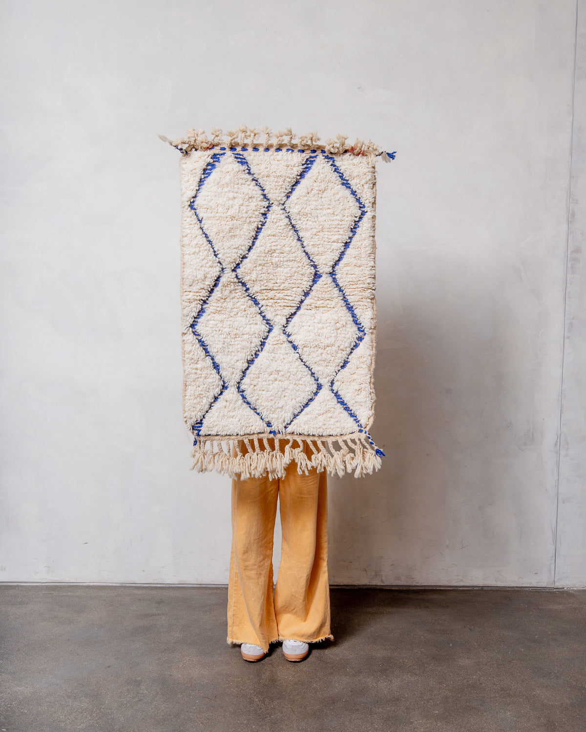 Modern, designer, handcrafted Berber rug from Morocco. Beniourain carpet with beautiful colours and patterns and fluffy wool texture.